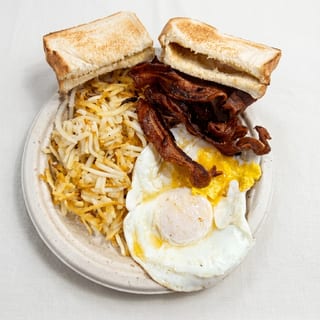 2 Eggs, Bacon or Sausage, Hash Browns & Toast